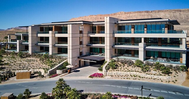 view of building exterior featuring a mountain view