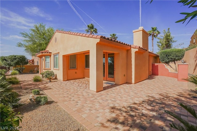 back of house featuring a patio