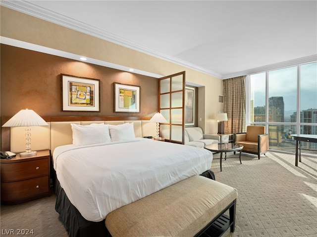 carpeted bedroom featuring ornamental molding