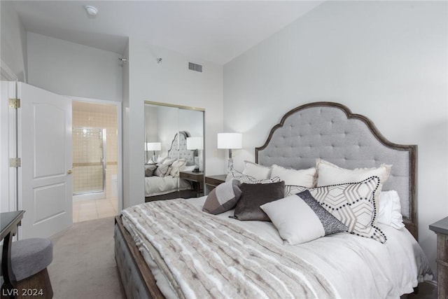 30 Strada Di Villaggio 248, Henderson, NV 89011 - bedroom featuring ensuite bathroom, carpet, and a closet