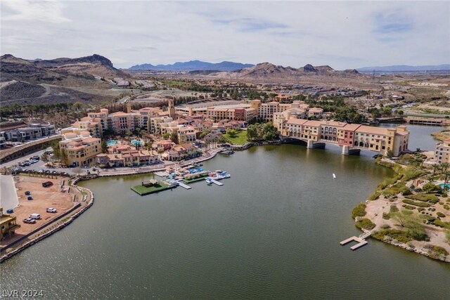 30 Strada Di Villaggio 248, Henderson, NV 89011 - drone / aerial view with a water and mountain view