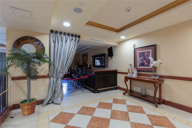 30 Strada Di Villaggio 248, Henderson, NV 89011 - interior space with light tile patterned floors and a tray ceiling