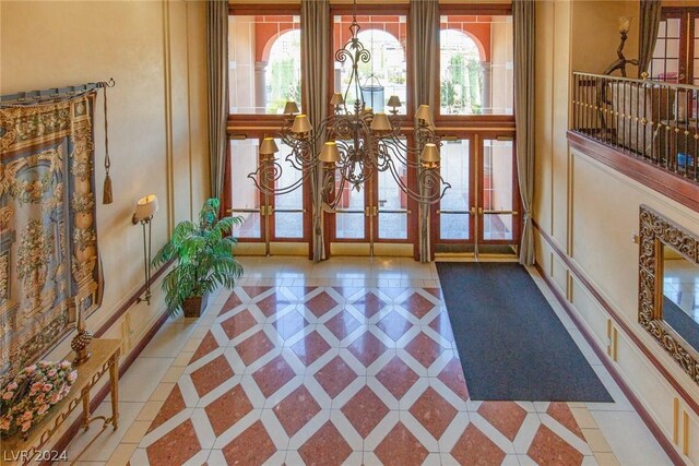 30 Strada Di Villaggio 248, Henderson, NV 89011 - tiled foyer with french doors and a wealth of natural light