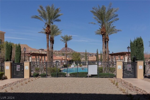 30 Strada Di Villaggio 248, Henderson, NV 89011 - view of gate with a community pool