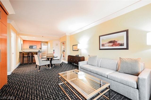 carpeted living room with ornamental molding