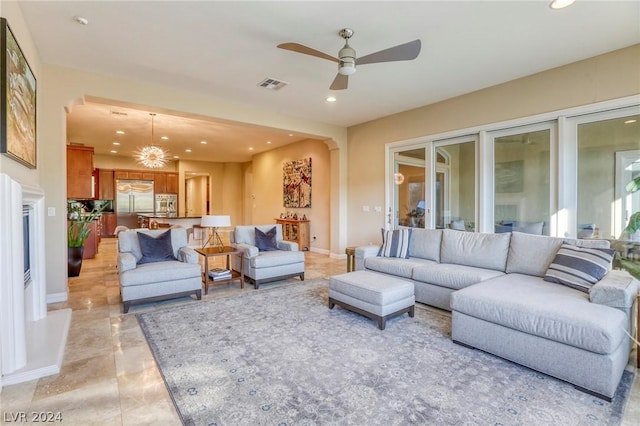 living room featuring ceiling fan