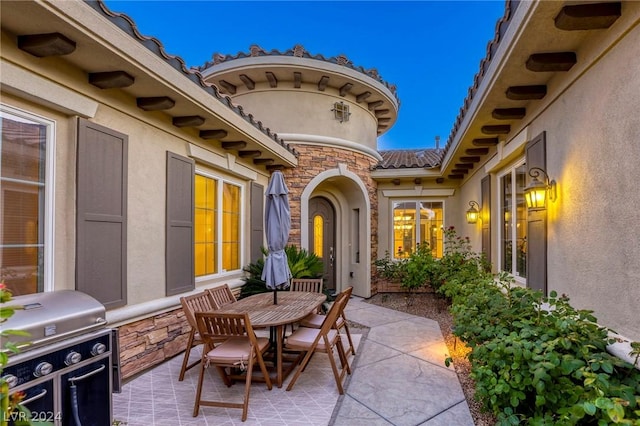 view of patio / terrace with a grill