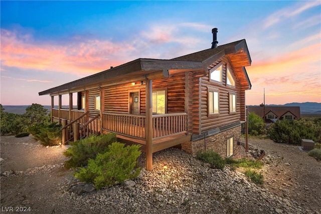 view of property exterior at dusk