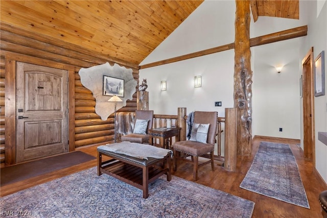 living area with high vaulted ceiling, wooden ceiling, dark hardwood / wood-style floors, and log walls