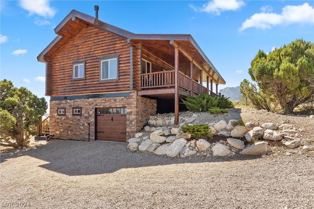 view of property exterior featuring a garage