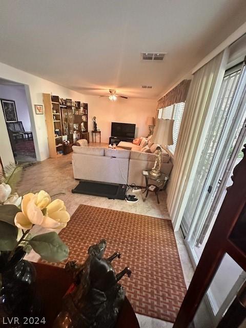 living room with ceiling fan