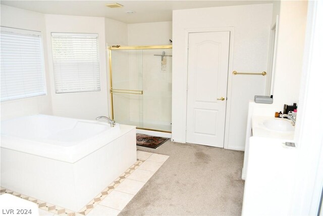 bathroom with vanity and plus walk in shower