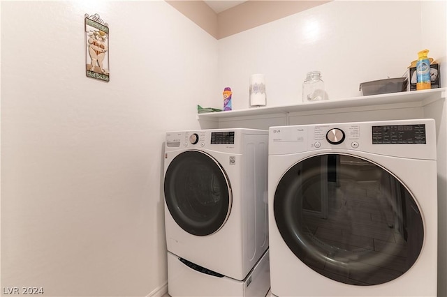 laundry room with washer and dryer