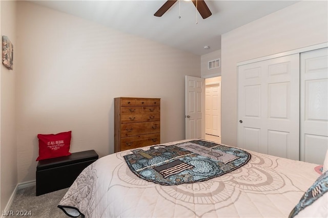 bedroom featuring carpet flooring, ceiling fan, and a closet