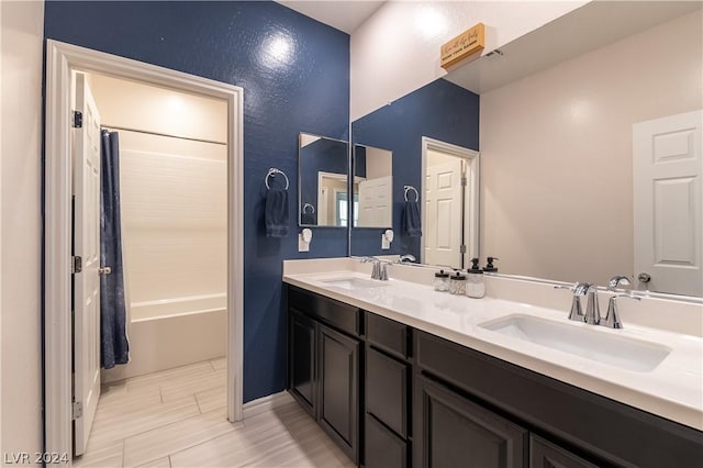 bathroom with vanity and shower / bath combination with curtain