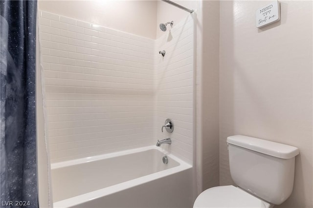 bathroom with toilet and shower / washtub combination