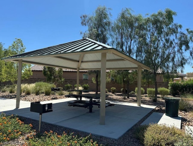 view of home's community with a gazebo and a patio area