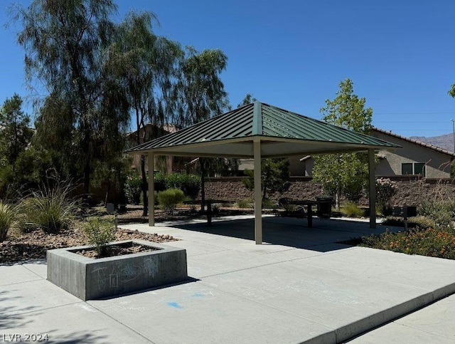 view of home's community with a gazebo and a patio