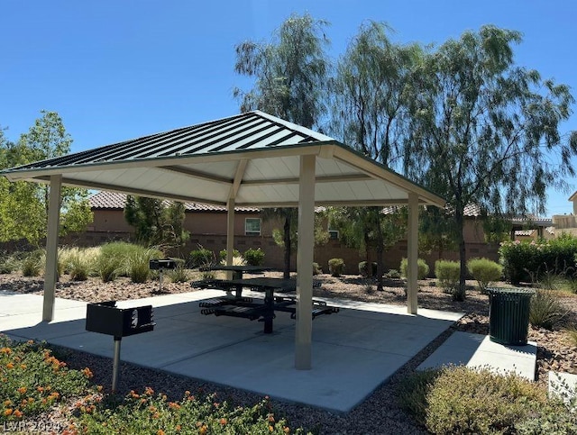 view of home's community with a gazebo and a patio