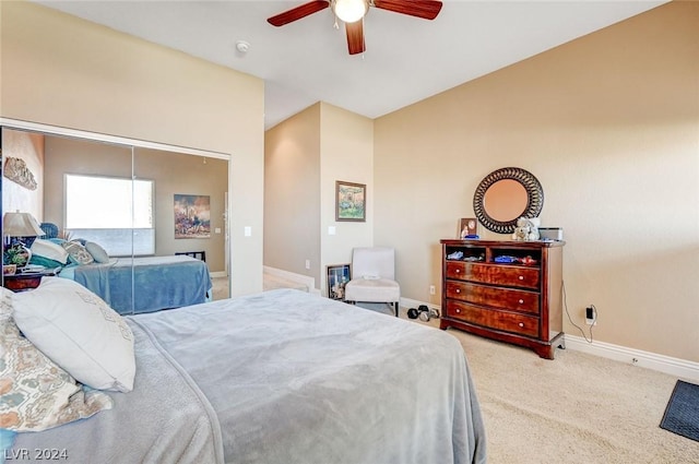 bedroom with ceiling fan and carpet