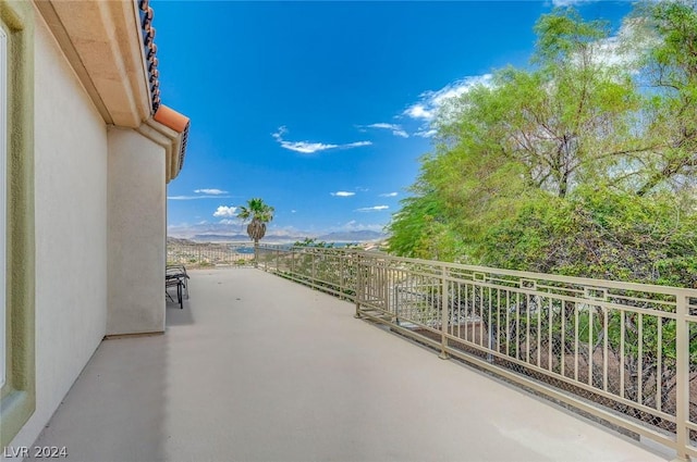 view of patio with a balcony