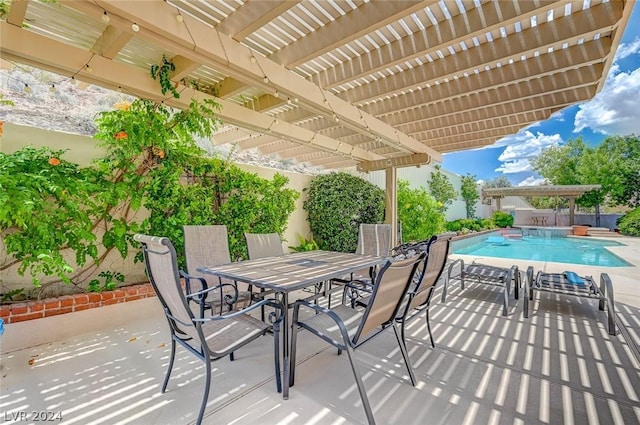 view of patio / terrace featuring a pergola and a fenced in pool