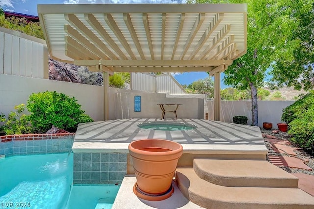 view of patio featuring a swimming pool with hot tub and a pergola