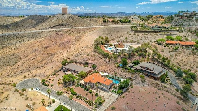 drone / aerial view featuring a mountain view