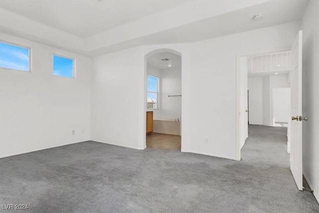 unfurnished room with carpet flooring