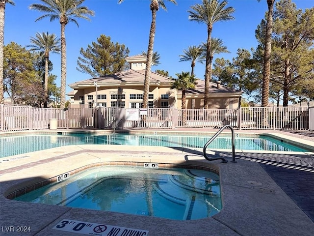 view of swimming pool featuring a patio area