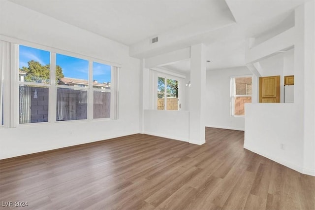 spare room featuring hardwood / wood-style floors