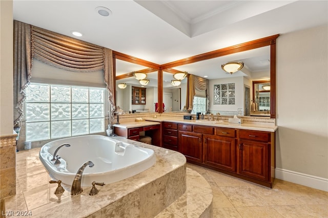 bathroom featuring tiled bath, vanity, and ornamental molding