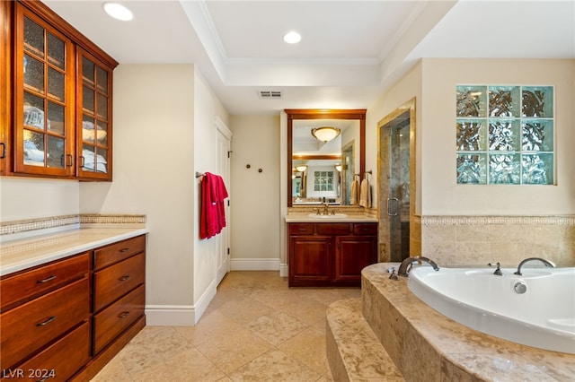 bathroom featuring ornamental molding, tile patterned floors, separate shower and tub, and vanity