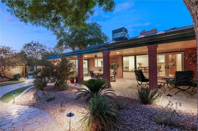 back of house with ceiling fan, central AC, and a patio