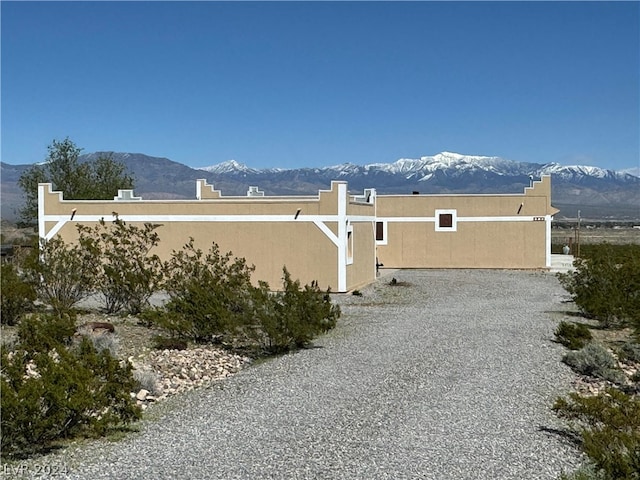 view of side of property featuring a mountain view