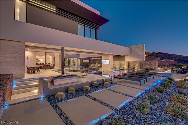 view of patio at twilight