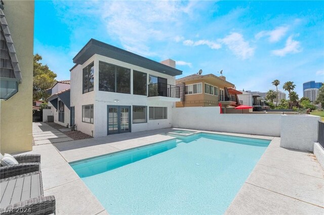 view of pool featuring a patio area