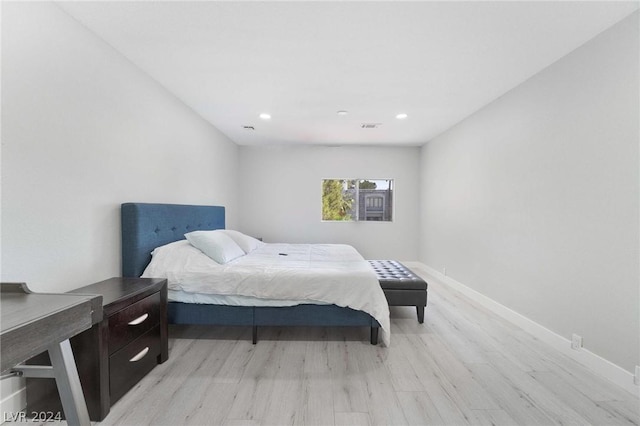 bedroom featuring light hardwood / wood-style floors