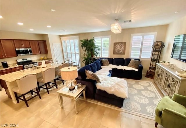 living room with light tile patterned floors