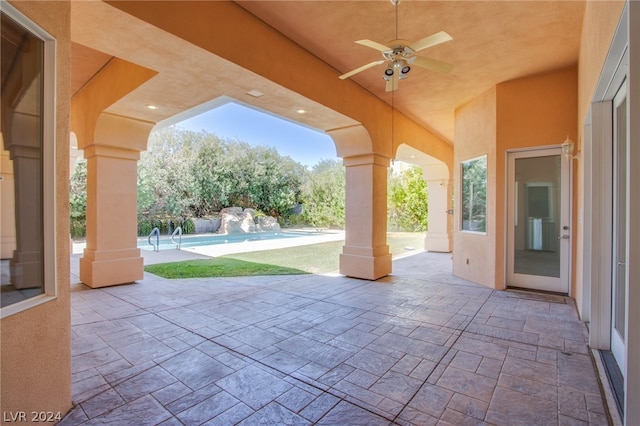 view of patio / terrace featuring ceiling fan