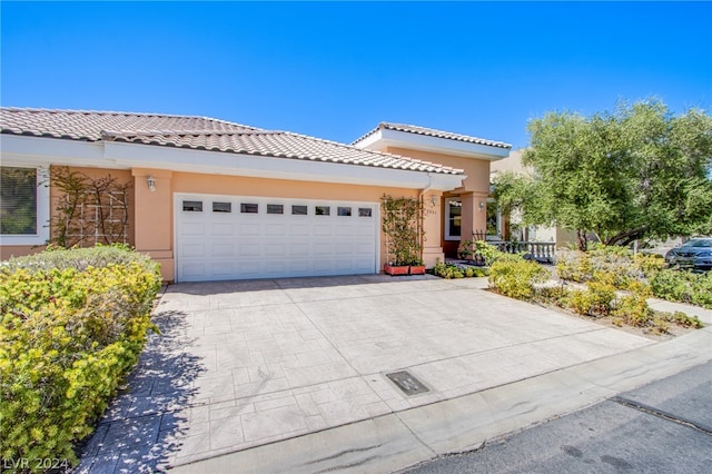 view of front of home with a garage