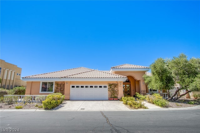 view of front of property featuring a garage