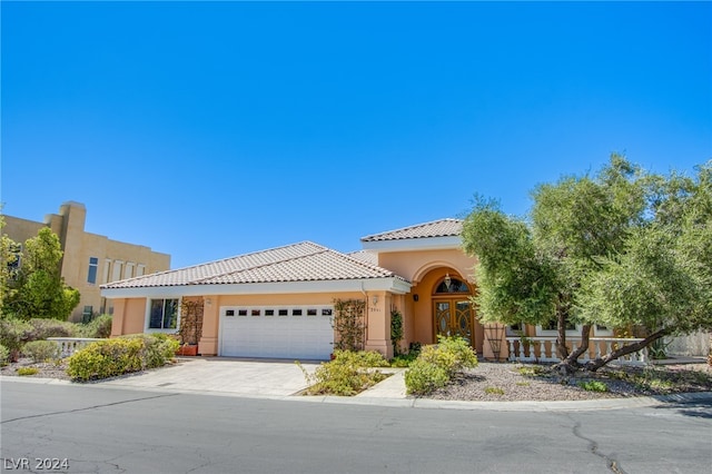 view of front of home with a garage