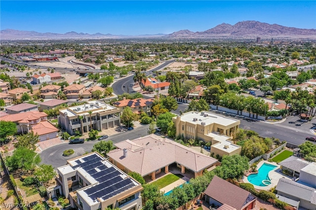 birds eye view of property featuring a mountain view