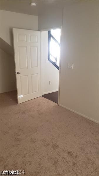 unfurnished bedroom featuring carpet floors