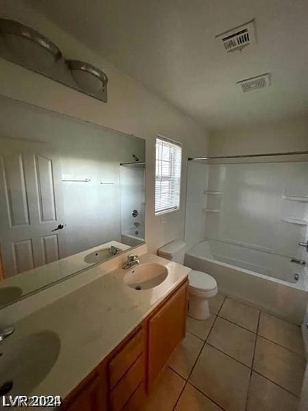 full bathroom featuring toilet, tile patterned flooring, tub / shower combination, and vanity