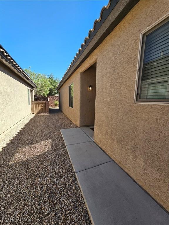 view of home's exterior with a patio area