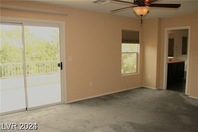 interior space featuring ceiling fan