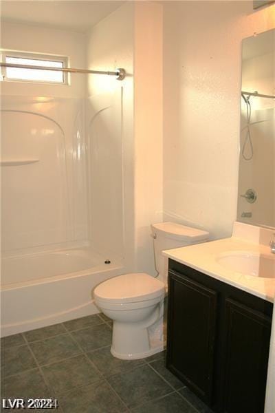 full bathroom with toilet, vanity, and bathtub / shower combination