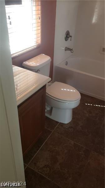 full bathroom with toilet, vanity, tile patterned floors, and  shower combination